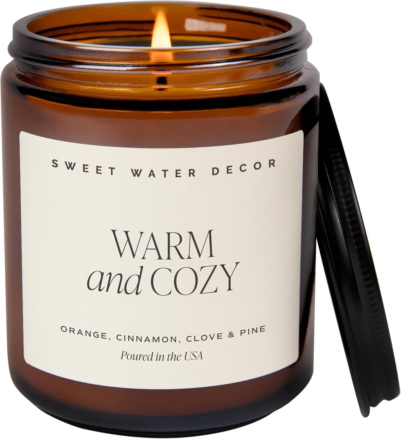 Sweet Water Decor Warm & Cozy Candle, 9oz Amber Glass Jar, Winter Scents